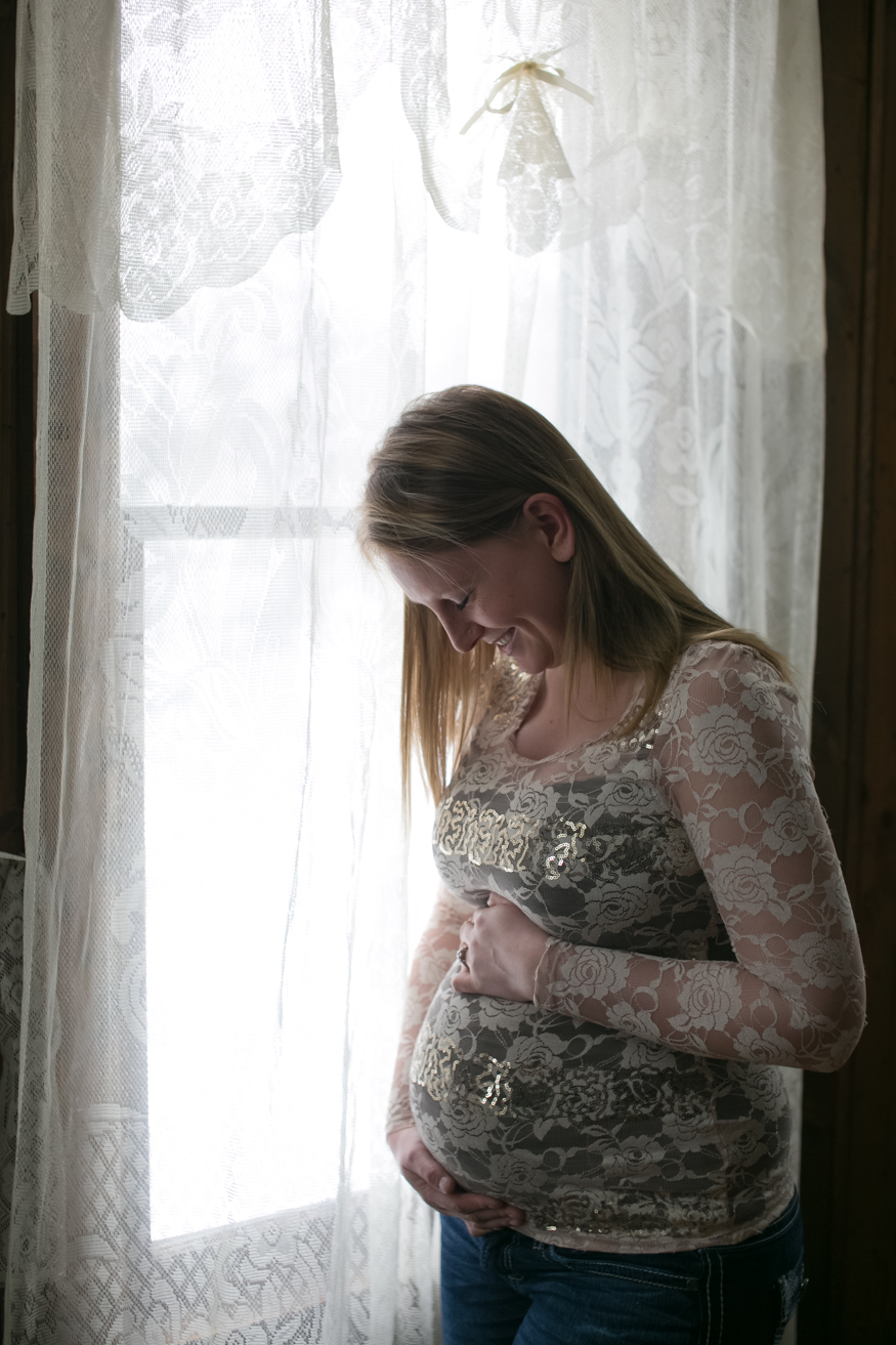 Minneapolis Photographer, maternity portraits, winter maternity session, pregnant mom, window, lace curtains