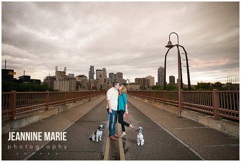 Stone Arch Bridge, Minneapolis, city skyline, couple, dogs, kiss