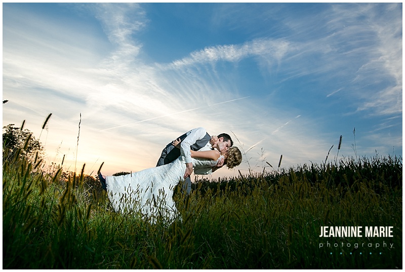 Mayowood Stone Barn, bride, groom, kiss, dip, grass, sky, sunset, clouds
