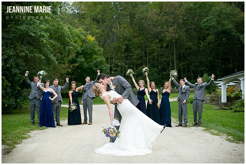 Mayowood Stone Barn, bridal party, bride, groom, bridesmaids, groomsmen, outside, kiss, celebrate, bouquets