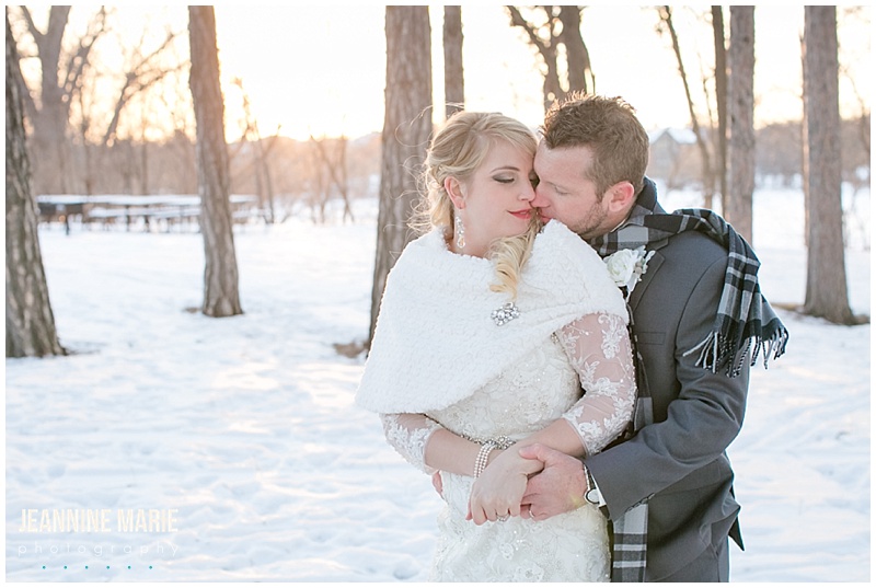 winter wedding, Minnesota wedding, groom, bride, sunset, sun, trees, snow