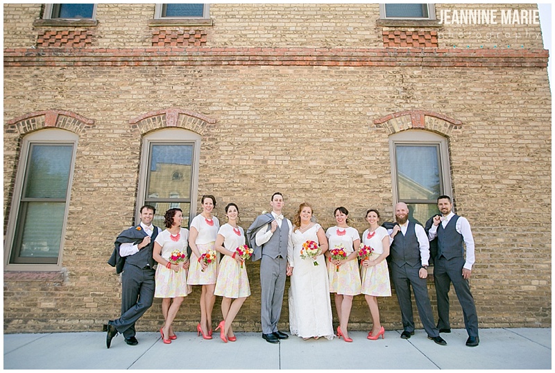 Chaska Minnesota wedding, bride, groom, bridal party, groomsmen, bridesmaids, casual wedding, summer wedding, building, brick wall