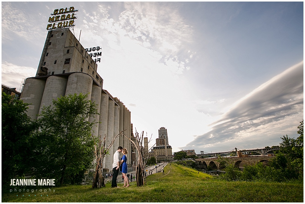 Minneapolis, building, grass, sky, arch, couple, poses, summer engagement session, engagement portraits, Minneapolis engagement, engaged, Minneapolis engagement session, Minnesota engagement photographer