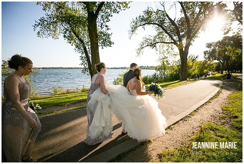 bride, walking, bridesmaids, carrying ballgown dress, lakeside view, Five Event Center, Festivities, Classic Catering, Instant Request DJ Entertainment, The Wedding Shoppe, indoor wedding, fall wedding, Minneapolis wedding, Minneapolis wedding venues, Jeannine Marie Photography, Minneapolis wedding photographer, Saint Paul wedding photographer