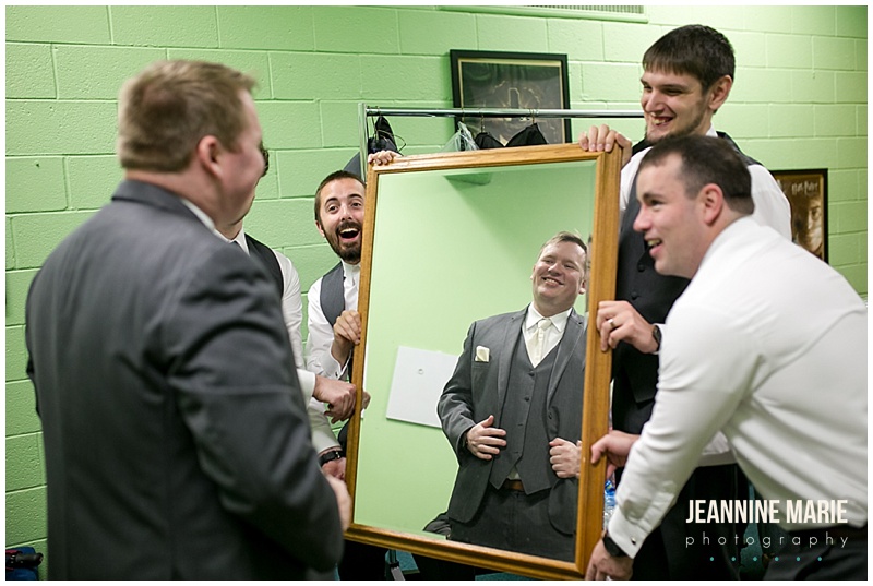 groom, groomsmen, mirror, getting ready, church wedding, Grace Lutheran Church, The Pavilion at Lake Elmo, Lakeside Floral, Lunds & Byerlys, Bellagala, Salon Ultimo, Luxe Bridal, Azazie, The Foursome, November wedding, Jeannine Marie Photography, Minnesota wedding photographer, Saint Paul wedding photographer