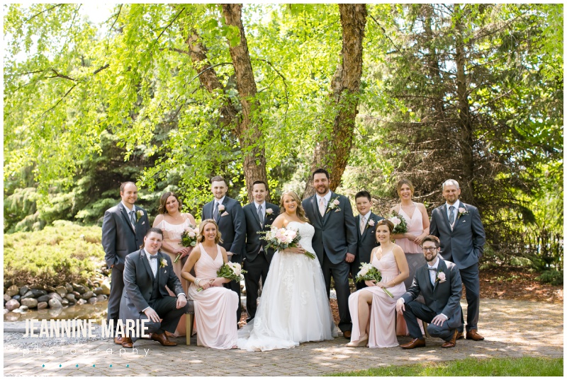 wedding party, bride, groom, bridesmaids, groomsmen, blush wedding flowers, blush bridesmaids dresses, gray suits, Courtyards of Andover, Melanie T Moy, Unique Dining Experiences Catering, Buttercream, Instant Request DJ, Mirror Me Perfect, Minnesota Officiants, Amata Salon, Lindsay Dukes Photography, Raffine Bridal, David's Bridal, Men's Wearhouse, Jeannine Marie Photography, Minnesota wedding photographer, Minneapolis wedding photographer, Courtyards of Andover wedding photographer, wedding photography, Minnesota wedding photography, wedding photographers near me, best Minnesota wedding photography, intimate wedding, budget wedding, blush wedding, summer wedding, pink wedding, pink flowers, outdoor wedding ceremony, ballroom wedding, Minnesota wedding venues