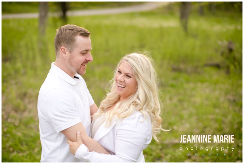 green grass, greenery, couple, laughing, embrace, Bavaria Downs, engagement, engagement session, engagement shoot, engagement photographer, engagement portraits, engagement photography, Bavaria Downs photographer, Bavaria Downs wedding photographer, Jeannine Marie Photography, Minnesota wedding photographer, Minnesota engagement photographer, Saint Paul engagement photographer, Saint Paul wedding photographer, Minneapolis engagement photographer, Minneapolis wedding photographer, Twin Cities engagement photographer, Twin Cities wedding photographer, Minnesota Bride, wedding, Minnesota weddings, unique wedding venues, Twin Cities wedding venues, Minnesota wedding venues
