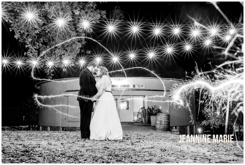 bride, groom, night portraits, sparklers, cafe lights, Round Barn Farm, fall wedding, autumn wedding, navy blue wedding, fall wedding floral, warm wedding floral, Jeannine Marie Photography, Ask for the Moon Events, Snowshoe Productions, A'BriTin Catering, Studio B Floral, Vistaprint, Mark Haugen DJ, Warpaint International, Luxe Bridal Couture, Men's Wearhouse, David's Bridal, Classic Cookie Do, Dough Dough, rustic wedding, barn wedding, Minnesota wedding, Minnesota barn wedding, Minnesota wedding photographer, Minneapolis wedding photographer, Saint Paul wedding photographer, midwest wedding photographer, Round Barn Farm wedding photographer