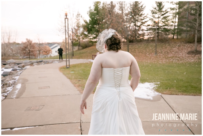 bride, corset, first look, Woodbury Central Park, indoor wedding venue, indoor amphitheater, winter wedding, evening wedding, jewel-toned floral, Dorothy Ann Bakery, Green Mill Catering, Wedding Connection, Black Suit, Steve Madden, intimate wedding, Jeannine Marie Photography, Saint Paul wedding photographer, Minnesota wedding photographer