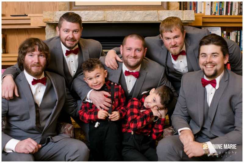 buffalo plaid, ring security, gray suits, red bow tie, groom, groomsmen, winter wedding, Christmas wedding, red wedding, Eagan Community Center, Wilderland Floral, Makeup by Mindie, Hair by Theresa, Raffine Bridal, Buttercream, Green Mill Catering, Jeannine Marie Photography, Eagan Community Center wedding photographer, Minneapolis wedding photographer, Eagan wedding photographer, Saint Paul wedding photographer, Minnesota wedding photographer, winter wedding photography
