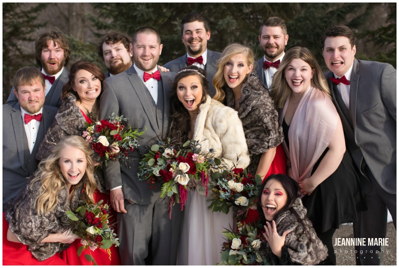 bride, groom, wedding party, red bridesmaids dresses, gray suit, winter wedding, Christmas wedding, red wedding, Eagan Community Center, Wilderland Floral, Makeup by Mindie, Hair by Theresa, Raffine Bridal, Buttercream, Green Mill Catering, Jeannine Marie Photography, Eagan Community Center wedding photographer, Minneapolis wedding photographer, Eagan wedding photographer, Saint Paul wedding photographer, Minnesota wedding photographer, winter wedding photography
