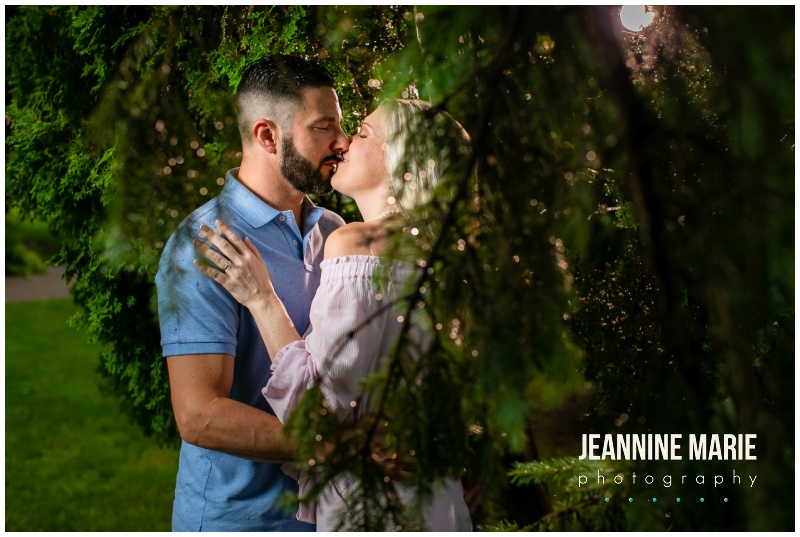 shadows, kiss, greenery, leaves, bushes, formal engagement portraits, white dress, gray suit, stormy engagement session, rainy engagement session, downtown Stillwater, St. Croix River, Royal Golf Club wedding, Stillwater engagement session, Twin Cities engagement session, Saint Paul engagement photographer, Minnesota engagement photographer, Stillwater engagement photographer, Saint Paul wedding photographer, Minnesota wedding photographer, Jeannine Marie Photography