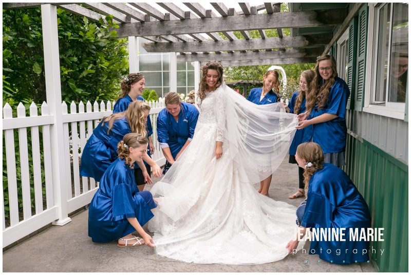bride, bridal gown, wedding dress, bridesmaids, blue bridesmaids robes, Mystical Rose gardens, fairytale wedding, outdoor wedding, outdoor Wisconsin wedding venue, Cinderella wedding, blue wedding, greenery, Cinderella carriage, lace ballgown, Jeannine Marie Photography, Wisconsin wedding photographer, covid wedding, pandemic wedding, romantic wedding, Dorothy Ann Bakery, Men's Wearhouse, Bella Bridal boutique, Creative Catering by Molly, Anna May Flowers, Men's Wearhouse, JJ's House, Zazzle, James Allen, Wisconsin Bride, wedding inspiration, wedding planning