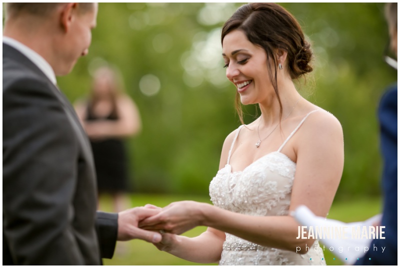outdoor ceremony, bride, ring exchange, Northern Minnesota wedding, private residence, backyard wedding, pandemic wedding, intimate wedding, Northern Minnesota wedding photographer, Saint Paul wedding photographer, Jeannine Marie Photography