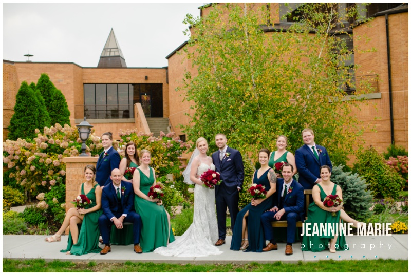 wedding party, green bridesmaids dresses, navy best woman dress, navy suits, green bridesmaids dresses, navy suits, burgundy wedding floral, hotel wedding, church wedding, fall wedding, covid wedding, pandemic wedding, Jeannine Marie Photography, Minnesota wedding photographer, Lakeville wedding photographer, Bloomington wedding photographer, Twin Cities wedding photographer, Minneapolis wedding photographer, All Saints Catholic Church, Sheraton Bloomington Hotel, Colleen’s Flower Cellar, Queen of Cakes, Instant Request DJ, Minted, Salon Concepts, Ella Rose, Raffine Bridal, Shane Co., Azazie, Men’s Wearhouse