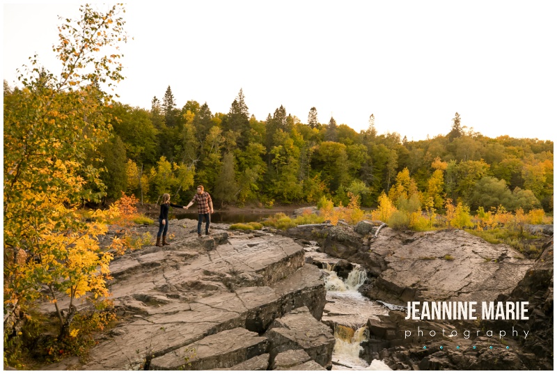 couple, walking, rocks, woods, river, Jay Cooke State Park, fall colors, Minnesota fall, fall engagement session, Northern Minnesota engagement session, Duluth engagement session, Jeannine Marie Photography, Northern Minnesota engagement photographer, Duluth engagement photographer, Minnesota engagement photographer, Twin Cities engagement photographer, Duluth wedding photographer, Minnesota wedding photographer, fall engagement portraits, nature engagement portraits, outdoor engagement portraits