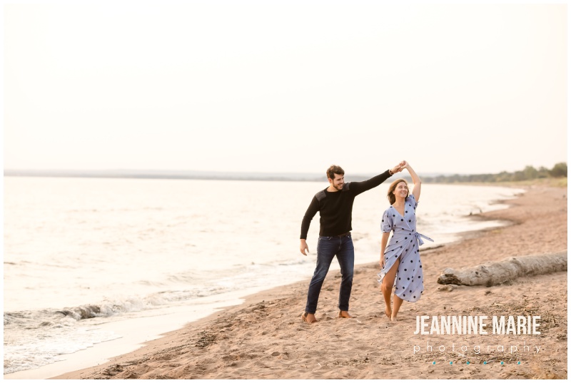 twirling, dancing, beach engagement session, beach, Lake Superior, Park Point, Duluth engagement session, Duluth wedding, Northern Minnesota engagement session, Duluth engagement photographer, Duluth wedding photographer, Minnesota wedding photographer, Minnesota engagement photographer, outdoor engagement session, Duluth engagement, Duluth bride, Minnesota wedding