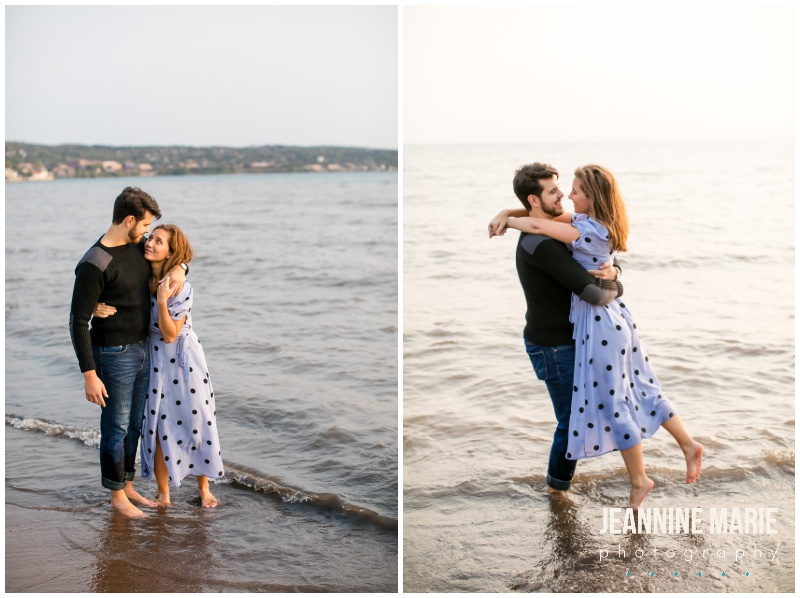 polka dot dress, waves, beach, lift, arms around each other, couple portraits, beach engagement session, beach, Lake Superior, Park Point, Duluth engagement session, Duluth wedding, Northern Minnesota engagement session, Duluth engagement photographer, Duluth wedding photographer, Minnesota wedding photographer, Minnesota engagement photographer, outdoor engagement session, Duluth engagement, Duluth bride, Minnesota wedding