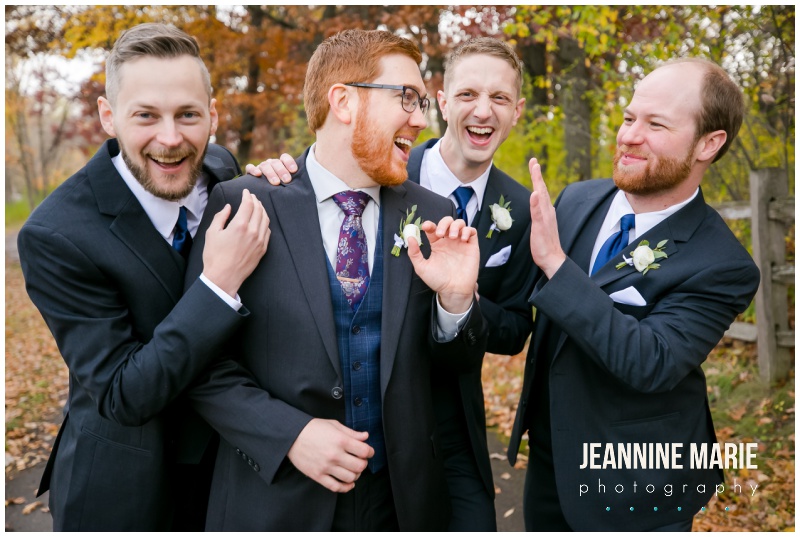 groom, groomsmen, black suits, navy vests, Revive Church, fall wedding, Minnesota fall wedding, church wedding, Minnesota church wedding, Twin Cities church wedding, indoor wedding, fall colors, fall leaves, Minnesota fall, Jeannine Marie Photography, Minnesota wedding photographer, Twin Cities wedding photographer, Nothing Bundt Cakes, A Milestone Paper Co, David's Bridal, Abloom Events, Shane Co, LHN Beauty, Broadway Party & Tent Rental
