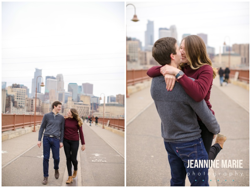 walking, lift, kiss, Aster Cafe, Stone Arch Bridge, Mississippi River, engagement portraits, engagement session, engagement outfits, winter engagement session, Minneapolis engagement photographer, Saint Paul engagement photographer, Minneapolis wedding photographer, Saint Paul wedding photographer, Jeannine Marie Photography