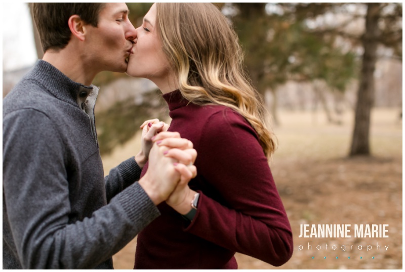 hands together, kiss, Aster Cafe, Stone Arch Bridge, Mississippi River, engagement portraits, engagement session, engagement outfits, winter engagement session, Minneapolis engagement photographer, Saint Paul engagement photographer, Minneapolis wedding photographer, Saint Paul wedding photographer, Jeannine Marie Photography