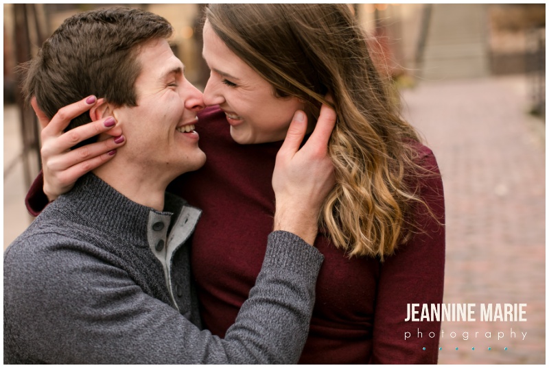 hand through hair, noses together, smiles, Aster Cafe, Stone Arch Bridge, Mississippi River, engagement portraits, engagement session, engagement outfits, winter engagement session, Minneapolis engagement photographer, Saint Paul engagement photographer, Minneapolis wedding photographer, Saint Paul wedding photographer, Jeannine Marie Photography