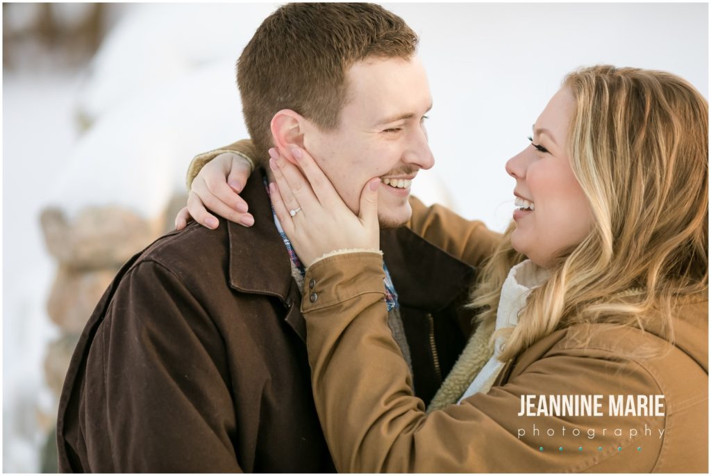 face to face, hand on cheek, laughing, smiling, couple portraits, winter engagement session, snowy engagement session, rustic engagement session, outdoor engagement session, Hope Glen Farm, Jeannine Marie Photography, Saint Paul engagement photographer, Minnesota engagement photographer