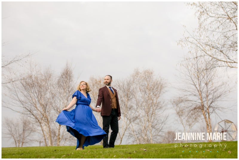 couple, outdoor portraits, trees, grass, Little Log Pioneer Village, Minnesota wedding photographer, Minnesota engagement photographer, Jeannine Marie Photography, rustic engagement session, vintage engagement session, cobalt blue dress, formal engagement session, antique cars, Hastings, Minnesota, Twin Cities engagement photographer
