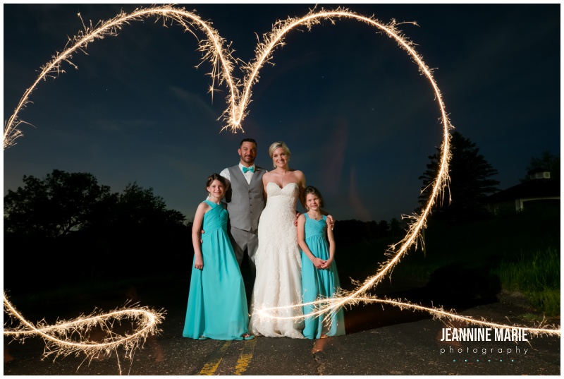 sparklers, bride, groom, daughters, family portraits, Blue and coral wedding, teal and coral wedding, aqua and coral wedding, summer wedding, Minnesota wedding venues, Minnesota wedding inspiration, outdoor wedding, outdoor ceremony, Royal Golf Club, Sweet Peas Floral, Buttercream Wedding Cakes, GenerationNOW Entertinament, Paper Source, Spa Beauty Agency, Wedding Shoppe Inc, Morilee Bridal, Bill Levkoff, Men’s Wearhouse, Jeannine Marie Photography, Minnesota wedding photographer, Saint Paul wedding photographer, Minnesota Bride, Twin Cities wedding photographer, Minnesota engagement photographer