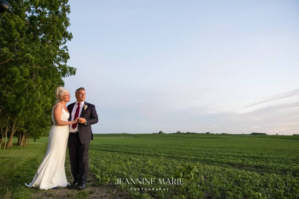 Portrait of bride and groom at country wedding photographed by West Saint Paul photographer Jeannine Marie Photography