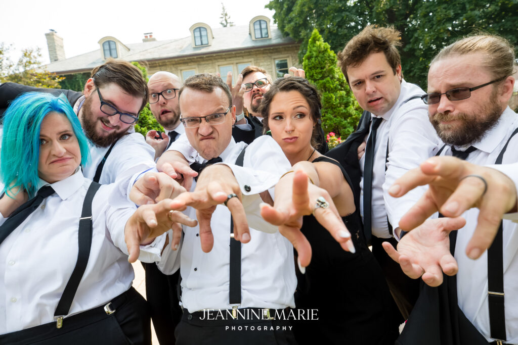 groomsmen poses for fun wedding party photos